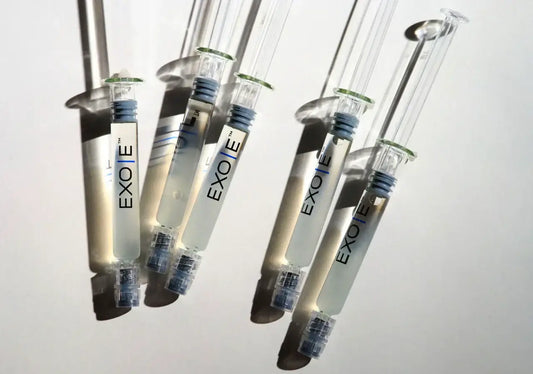 EXO|E syringes arranged in clinic setting – representing before and after exosome treatments