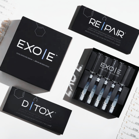 Collection of EXOIE, REPAIR, and DITOX skincare product boxes on a white background