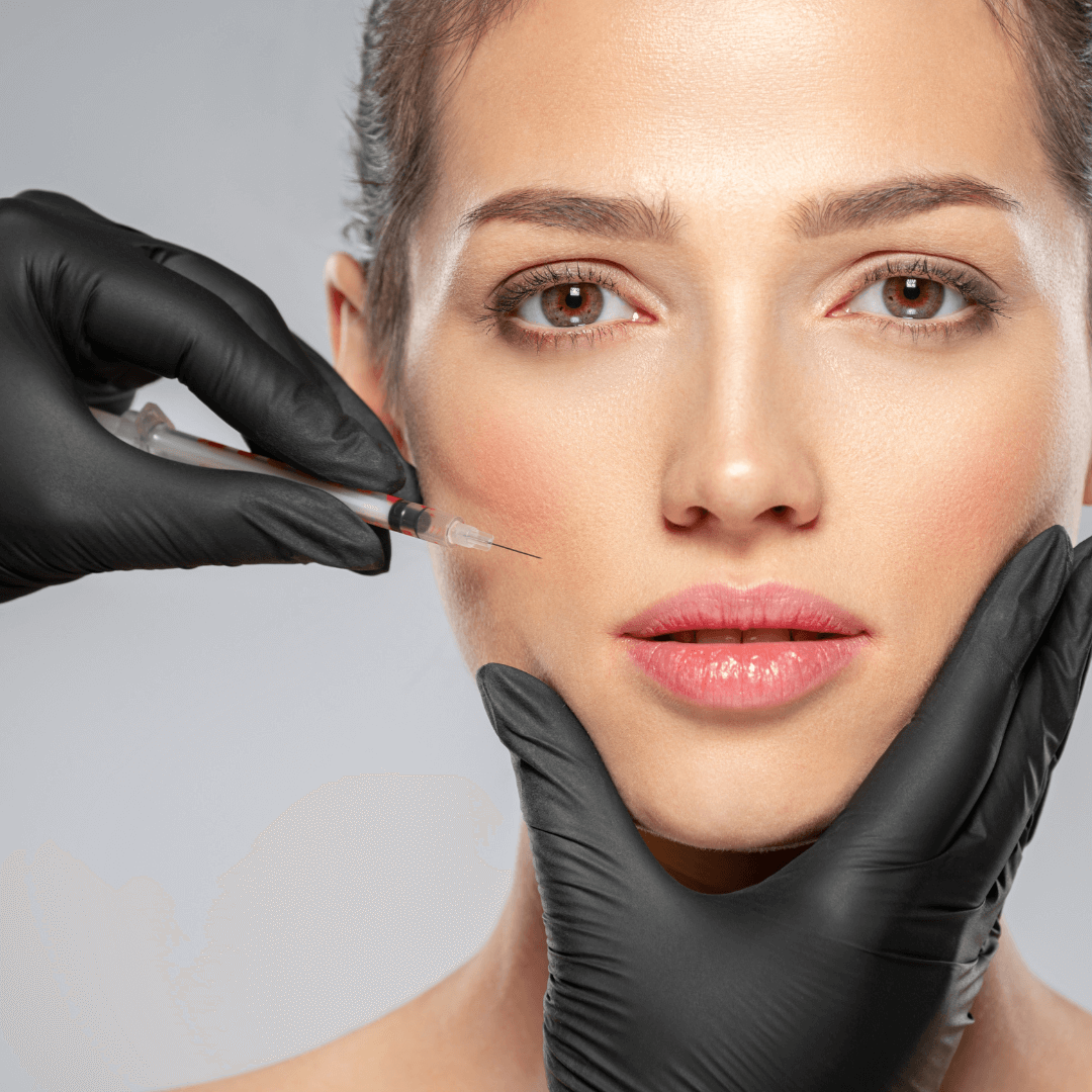 Close-up of facial injection by clinician in black gloves – polynucleotide skin rejuvenation