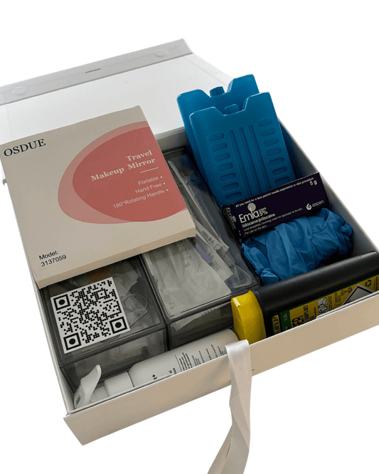 Clinical tools, including needles, syringes and cannulas as well as travel mirror, ruler, sharps bin, cool bag and ice pack set with various items in a box